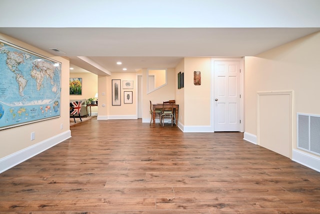 interior space with dark hardwood / wood-style floors