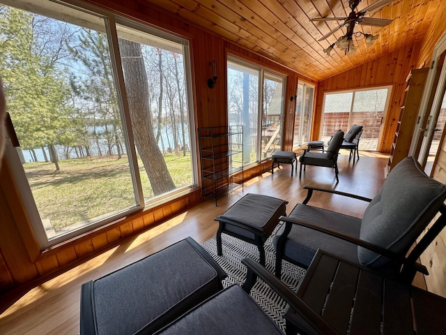 14788 Coyote Dr, Park Rapids, MN 56470 - sunroom / solarium with wood walls, lofted ceiling, a ceiling fan, wood finished floors, and wood ceiling