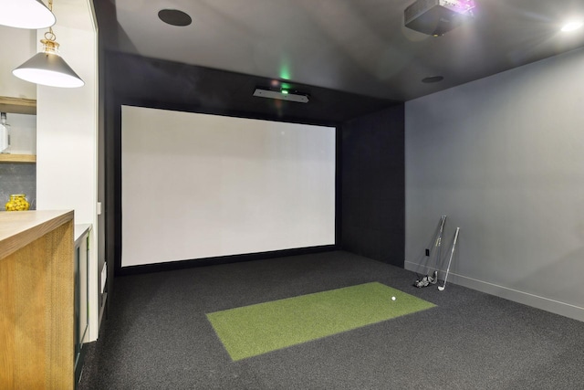 rec room featuring golf simulator and dark carpet