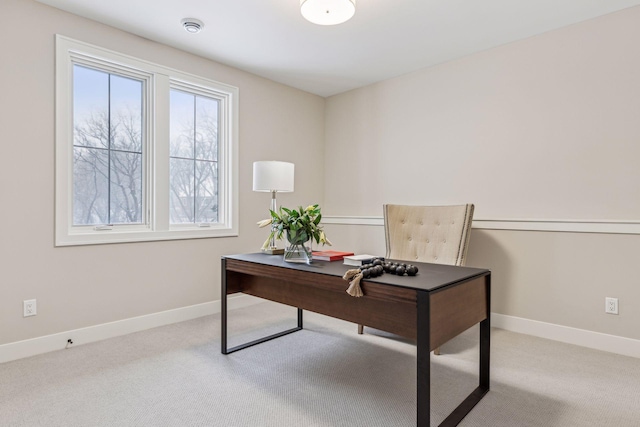office space with light colored carpet