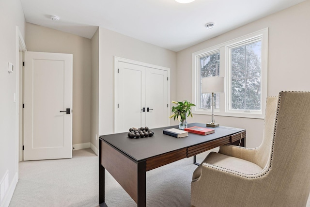 view of carpeted office space