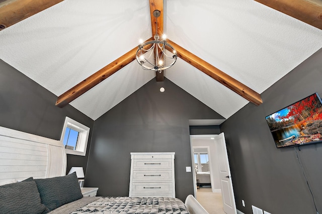 bedroom featuring lofted ceiling with beams and an inviting chandelier