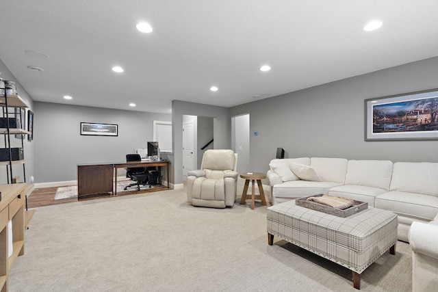 living room featuring light carpet