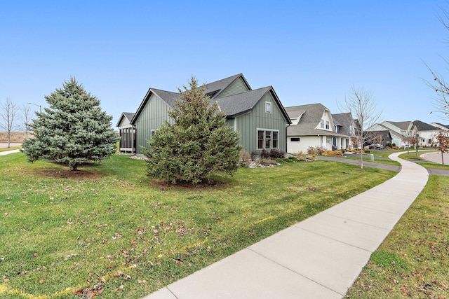 view of property exterior with a lawn