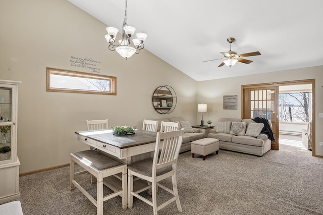 dining area with high vaulted ceiling, carpet, baseboards, and ceiling fan with notable chandelier