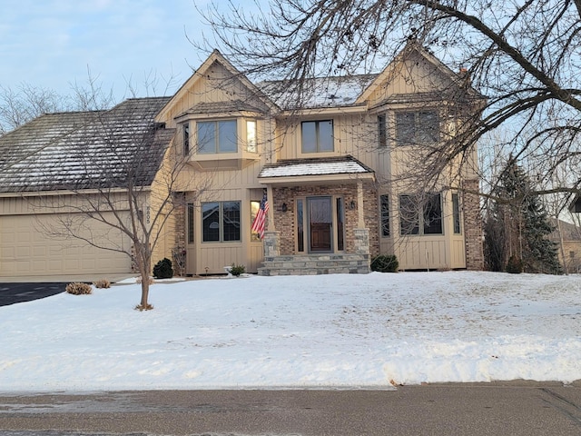 view of front of property with a garage