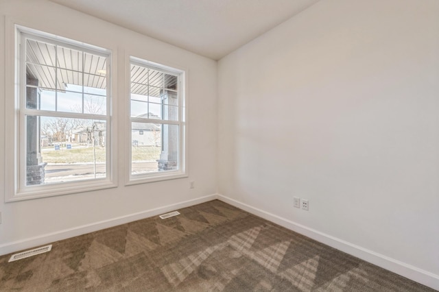 spare room with carpet flooring