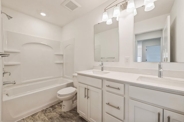 full bathroom featuring shower / bathtub combination, vanity, and toilet