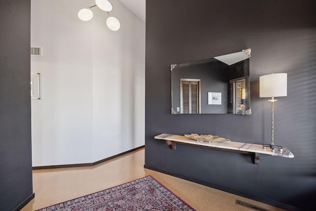 bathroom featuring visible vents and baseboards