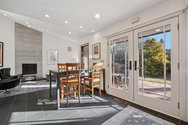 dining space featuring recessed lighting, french doors, and lofted ceiling