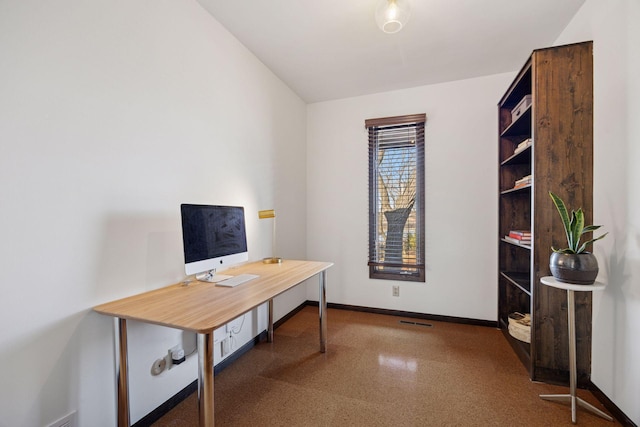 office space featuring visible vents and baseboards