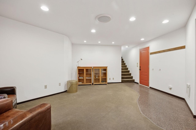 unfurnished room with recessed lighting, stairway, and baseboards