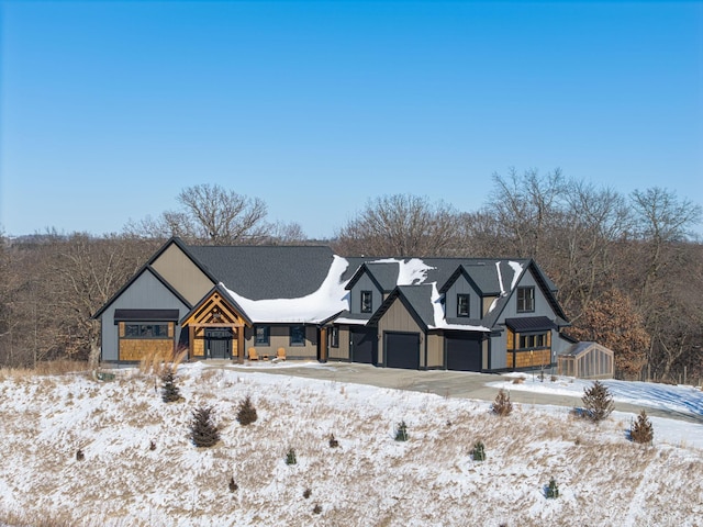 view of front of home featuring driveway and an attached garage