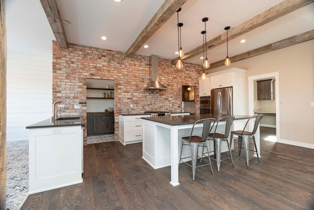 771 Zumbro Oaks Ln NW, Oronoco, MN 55960 - kitchen with dark wood-style flooring, wall chimney range hood, white cabinetry, dark countertops, and stainless steel appliances