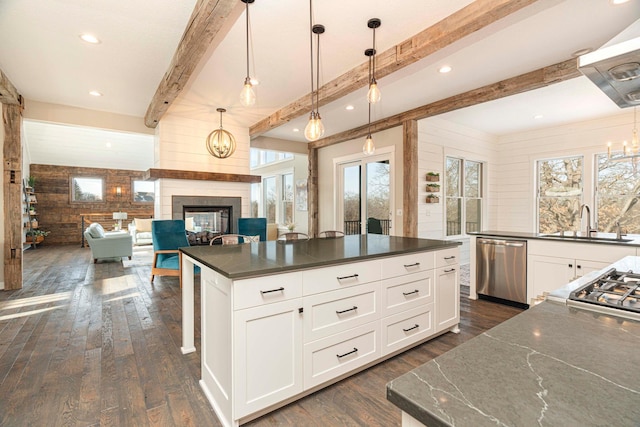 771 Zumbro Oaks Ln NW, Oronoco, MN 55960 - kitchen featuring dark wood-type flooring, wood walls, dishwasher, a sink, and beam ceiling