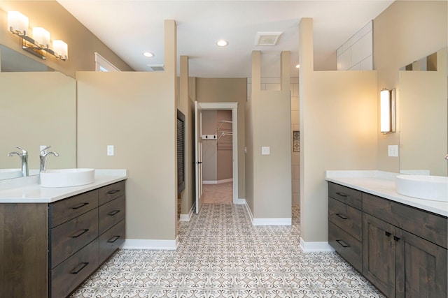 771 Zumbro Oaks Ln NW, Oronoco, MN 55960 - bathroom featuring a sink and two vanities