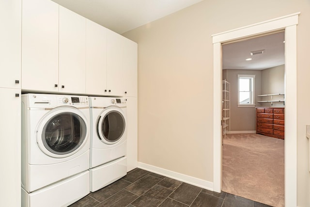 771 Zumbro Oaks Ln NW, Oronoco, MN 55960 - laundry room with separate washer and dryer, baseboards, visible vents, and cabinet space