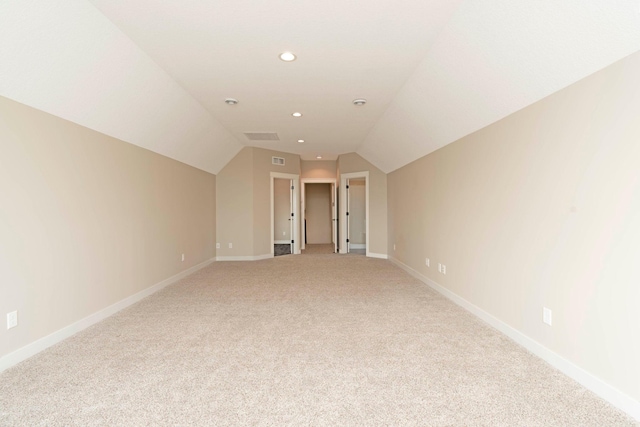 771 Zumbro Oaks Ln NW, Oronoco, MN 55960 - bonus room featuring visible vents, vaulted ceiling, recessed lighting, light carpet, and baseboards