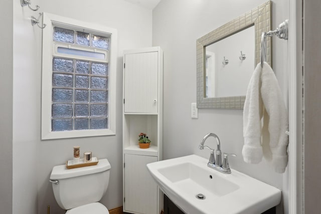 bathroom with a sink and toilet