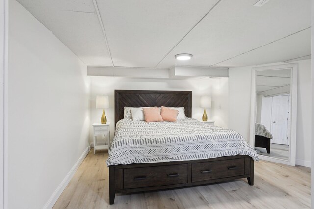 4244 Jefferson St NE, Columbia Heights, MN 55421 - bedroom with baseboards and light wood-style floors