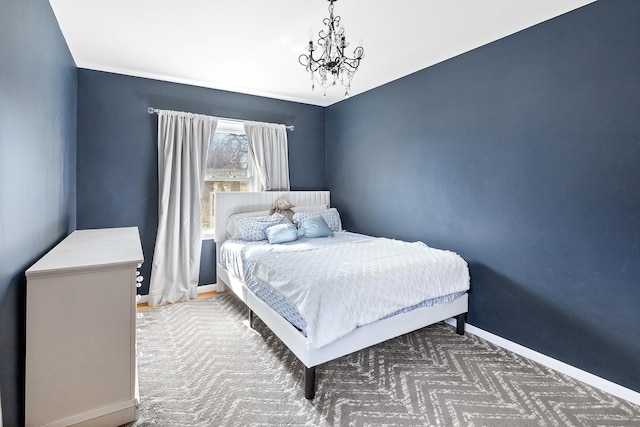 carpeted bedroom with baseboards