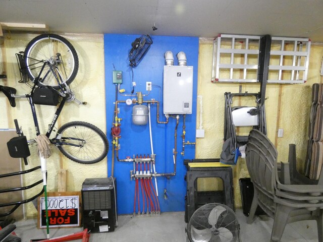 utility room with water heater