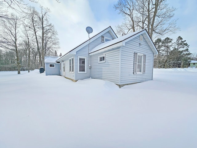 view of snow covered property