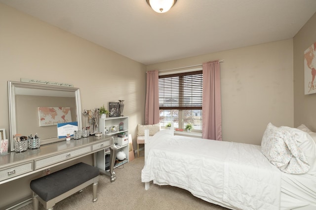 bedroom with carpet and lofted ceiling