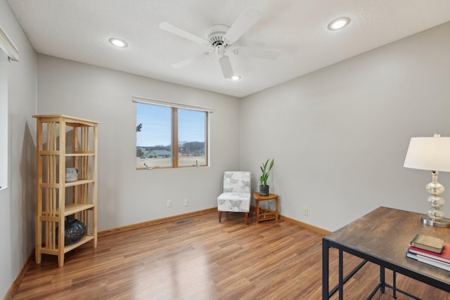 sitting room featuring baseboards, a ceiling fan, wood finished floors, and recessed lighting