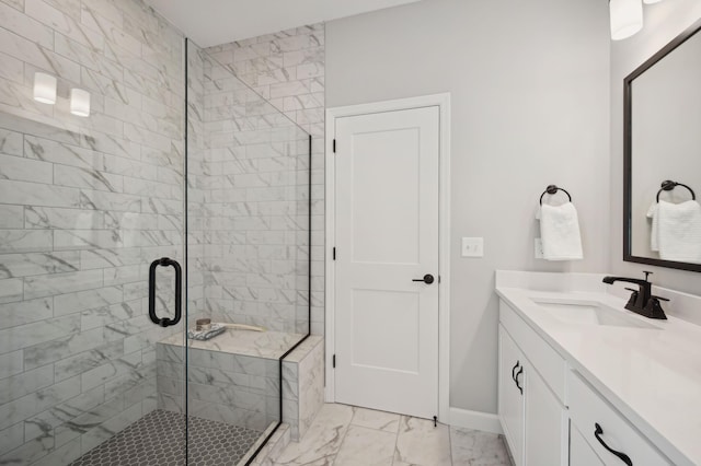 bathroom featuring vanity and a shower with door