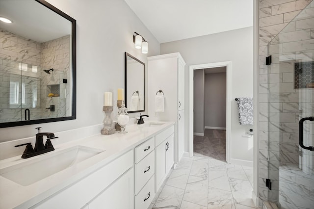 bathroom featuring vanity and a shower with shower door