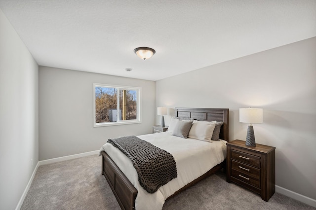 bedroom with light colored carpet