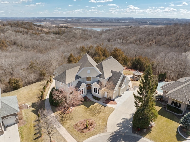 aerial view featuring a forest view