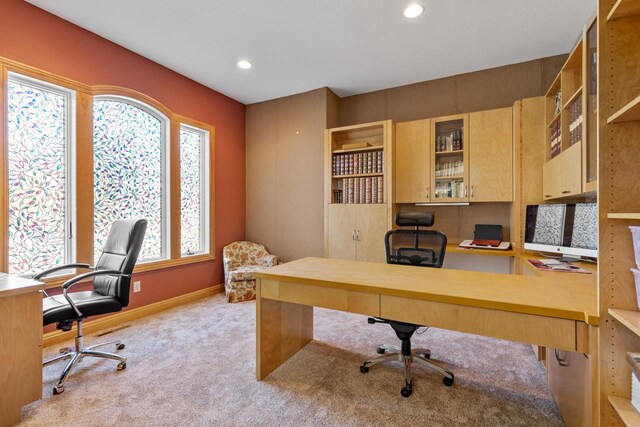 home office with baseboards, recessed lighting, and light colored carpet