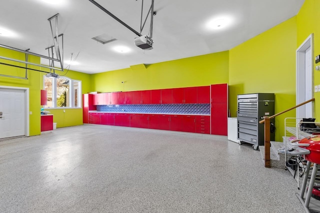 garage featuring a garage door opener