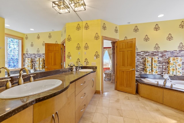 19115 Vogel Farm Trl, Eden Prairie, MN 55347 - bathroom with a garden tub and double vanity