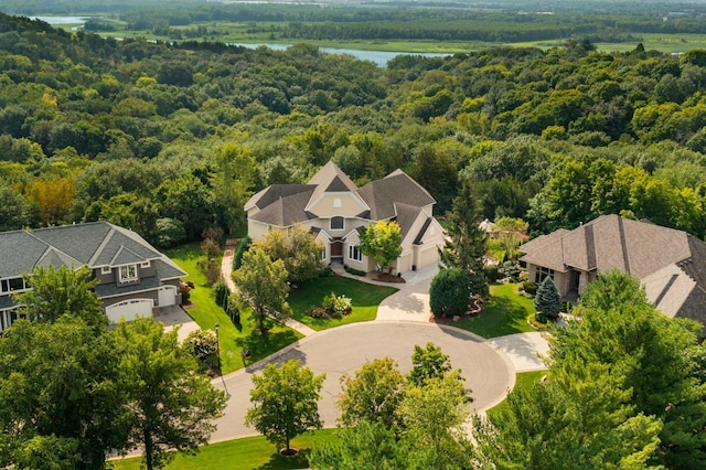 19115 Vogel Farm Trl, Eden Prairie, MN 55347 - aerial view of property and surrounding area with a heavily wooded area and a nearby body of water