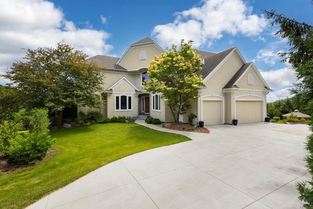19115 Vogel Farm Trl, Eden Prairie, MN 55347 - view of front of property featuring a garage, concrete driveway, a front lawn, and stucco siding