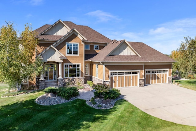 craftsman inspired home with an attached garage, stone siding, a front lawn, and concrete driveway