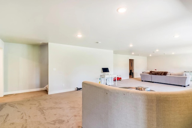 unfurnished living room featuring carpet floors