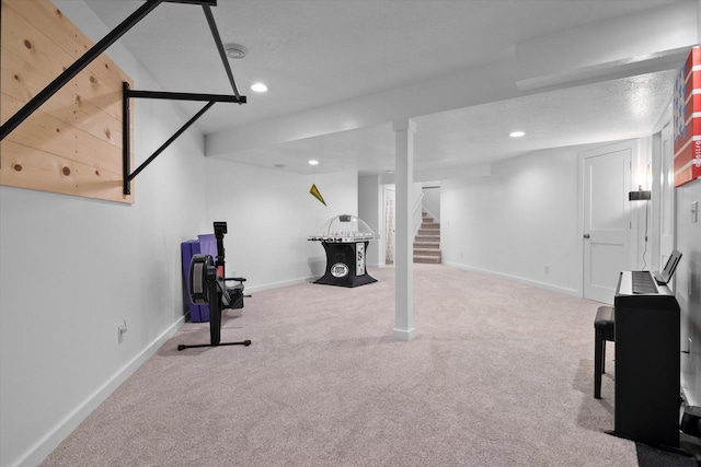 exercise room with carpet floors