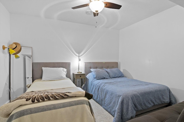 bedroom with vaulted ceiling and ceiling fan