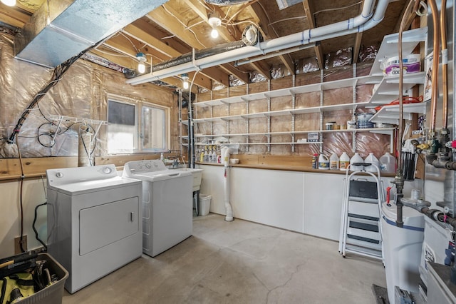 clothes washing area with laundry area and independent washer and dryer