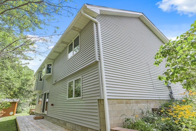 view of property exterior featuring entry steps