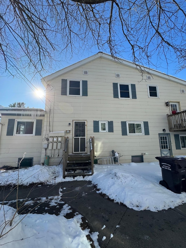 view of snow covered house