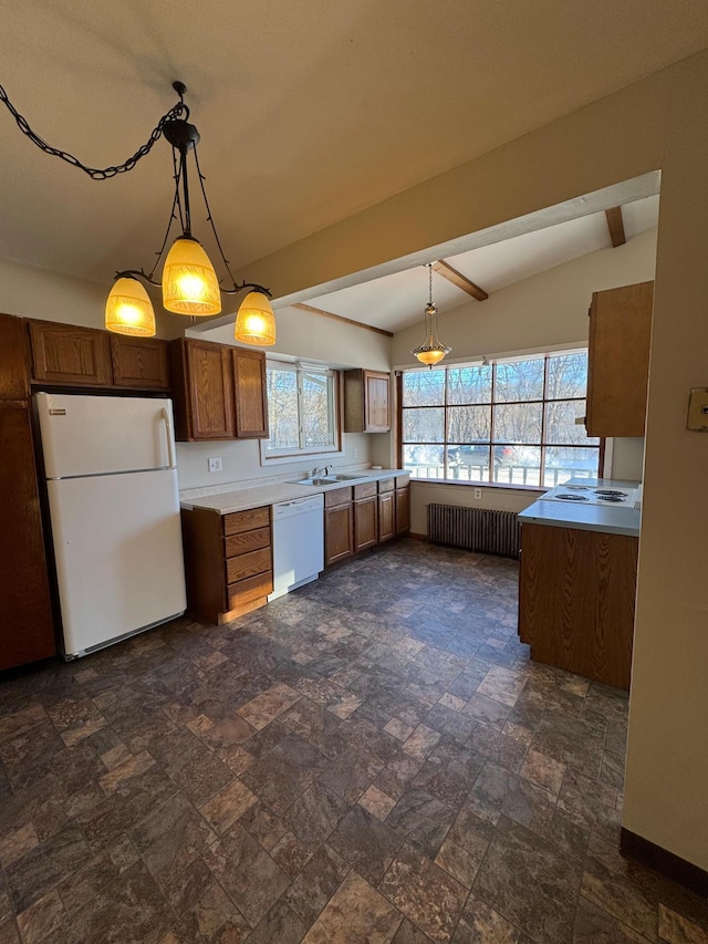 kitchen featuring white appliances, brown cabinetry, radiator, light countertops, and pendant lighting