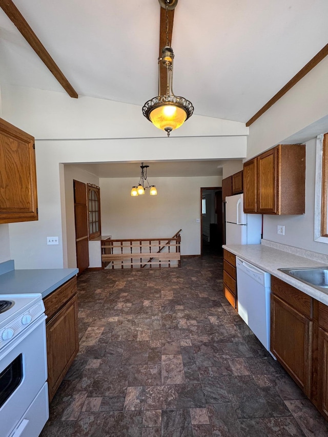 kitchen with vaulted ceiling with beams, white appliances, light countertops, brown cabinetry, and pendant lighting