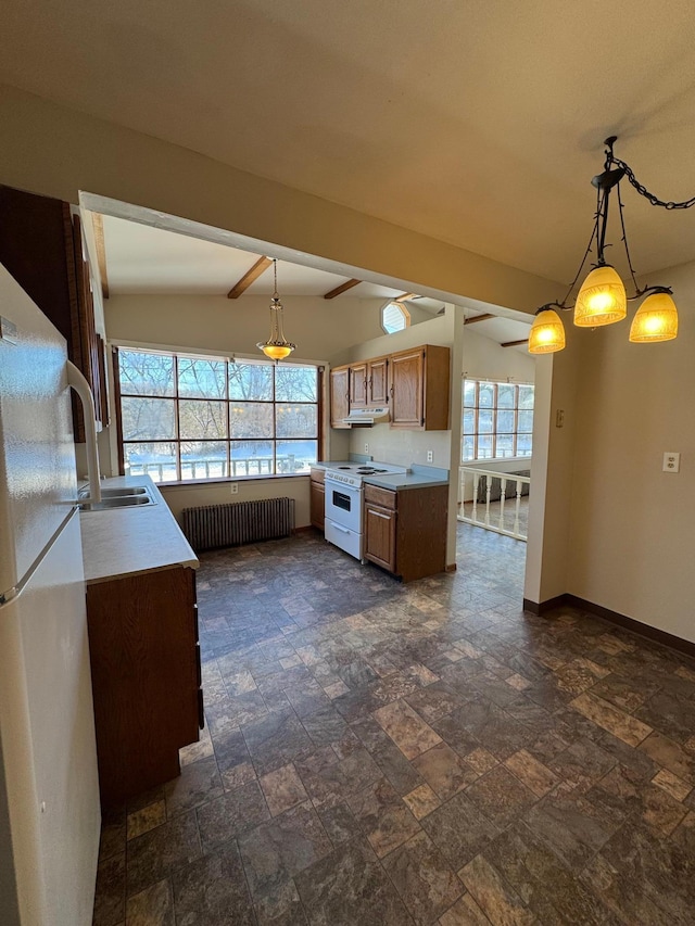 kitchen featuring light countertops, white appliances, radiator heating unit, and baseboards