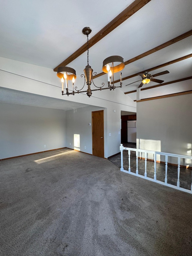 unfurnished room featuring carpet floors, beam ceiling, and ceiling fan with notable chandelier