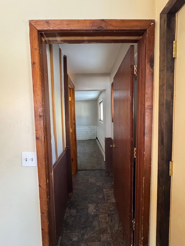 corridor with stone finish flooring